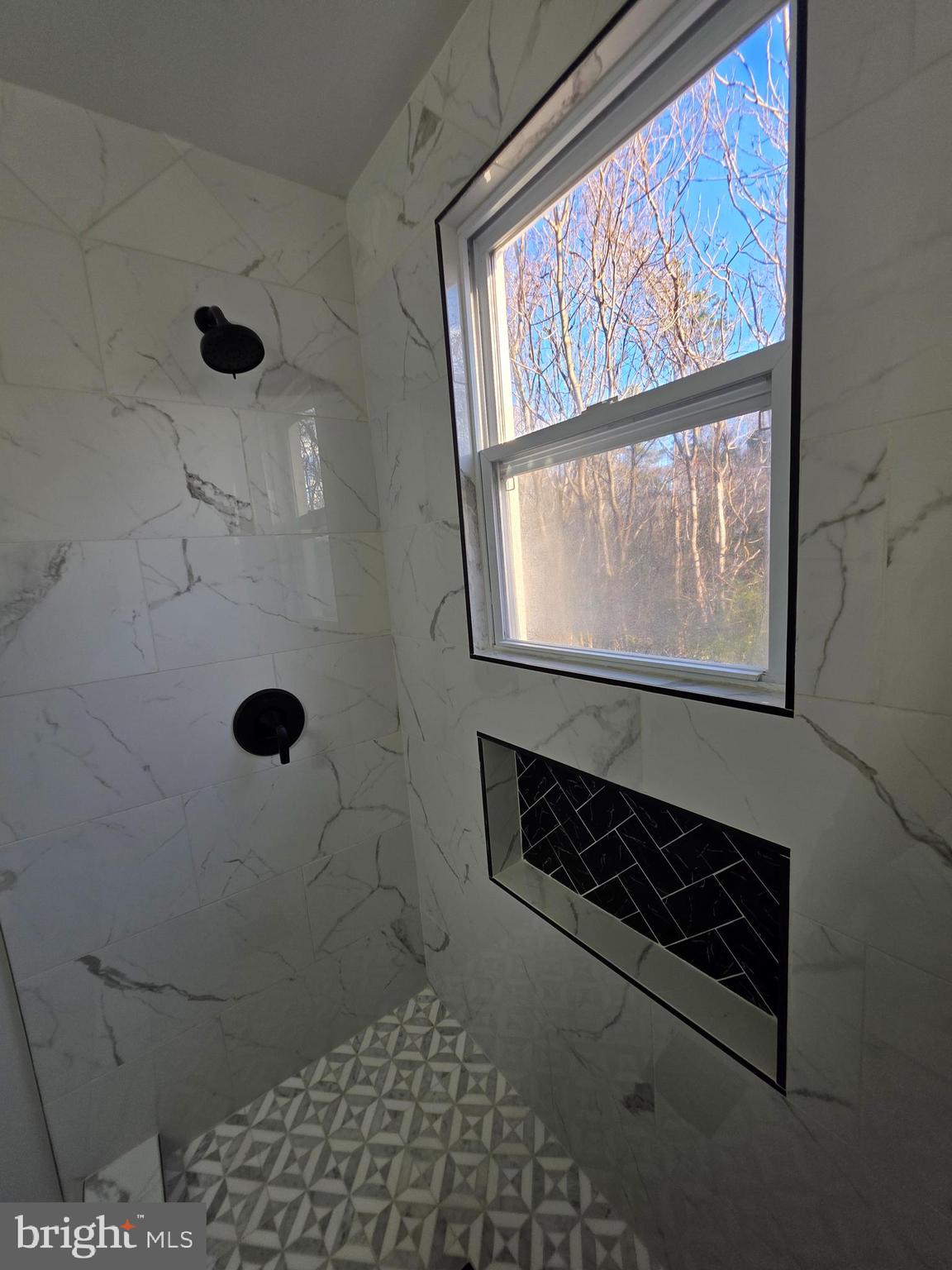 25294 Vista Road Hollywood, MD 20636 - Photo 25 of 53 a bathroom with a toilet a sink and a window