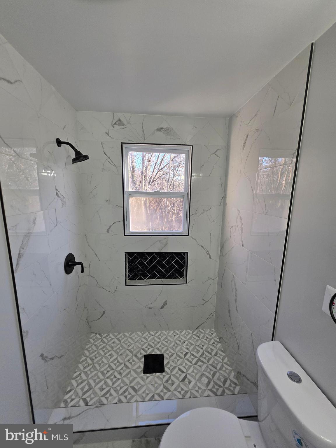 25294 Vista Road Hollywood, MD 20636 - Photo 29 of 53 a bathroom with a toilet sink and shower