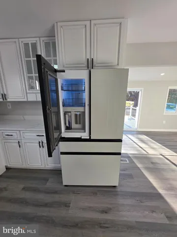 a view of livingroom with furniture and window