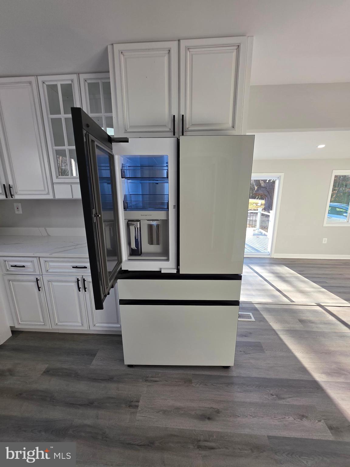 25294 Vista Road Hollywood, MD 20636 - Photo 35 of 53 a view of kitchen with cabinets and wooden floor