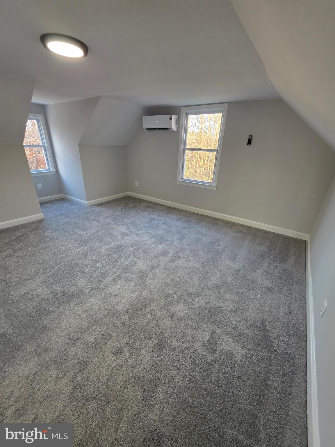 25294 Vista Road Hollywood, MD 20636 - Photo 45 of 53 an empty room with windows and entrance