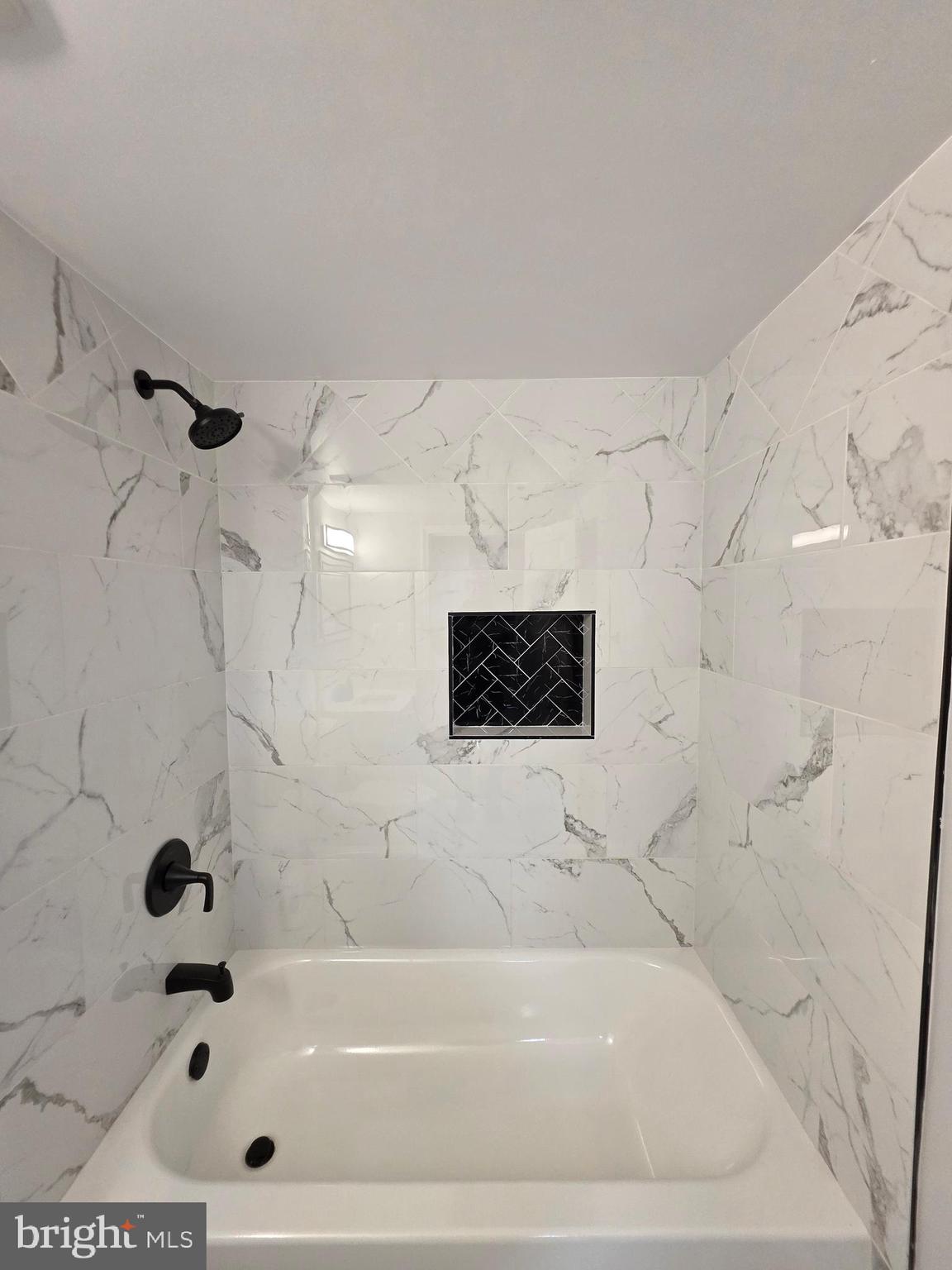 25294 Vista Road Hollywood, MD 20636 - Photo 48 of 53 a bathroom with a bathtub