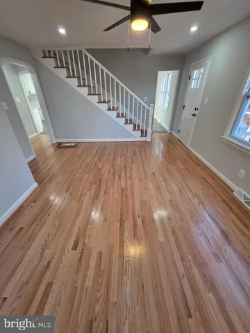 a view of entryway with wooden floor