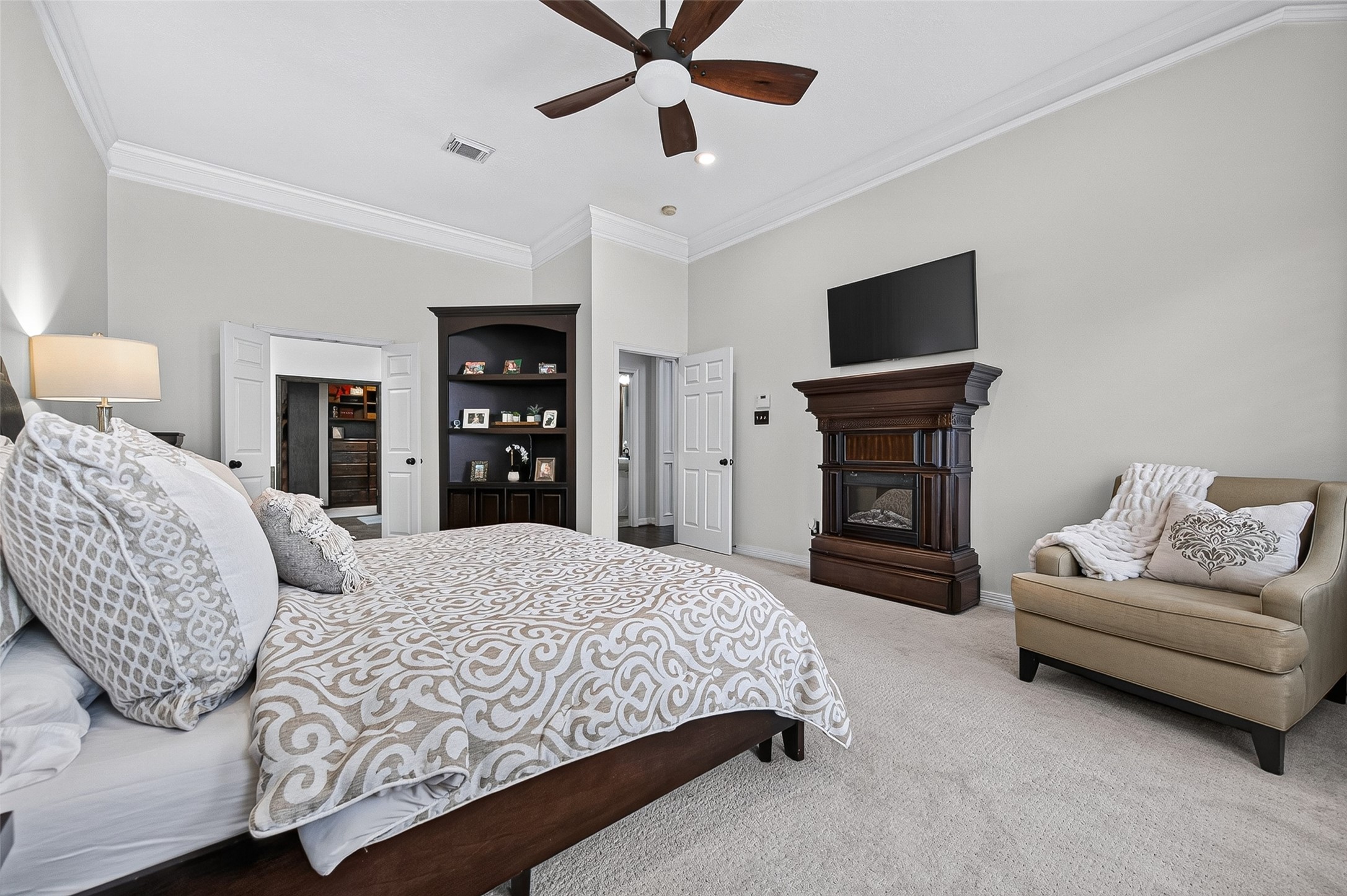 11822 Rue Beaujon Court Tomball, TX 77377 - Photo 24 of 50 The Primary has its own electric fireplace & a corner built-in.