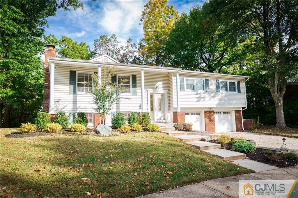 19 Bodnarik Road Edison, NJ 08837 - Photo 1 of 50 a front view of a house with a yard