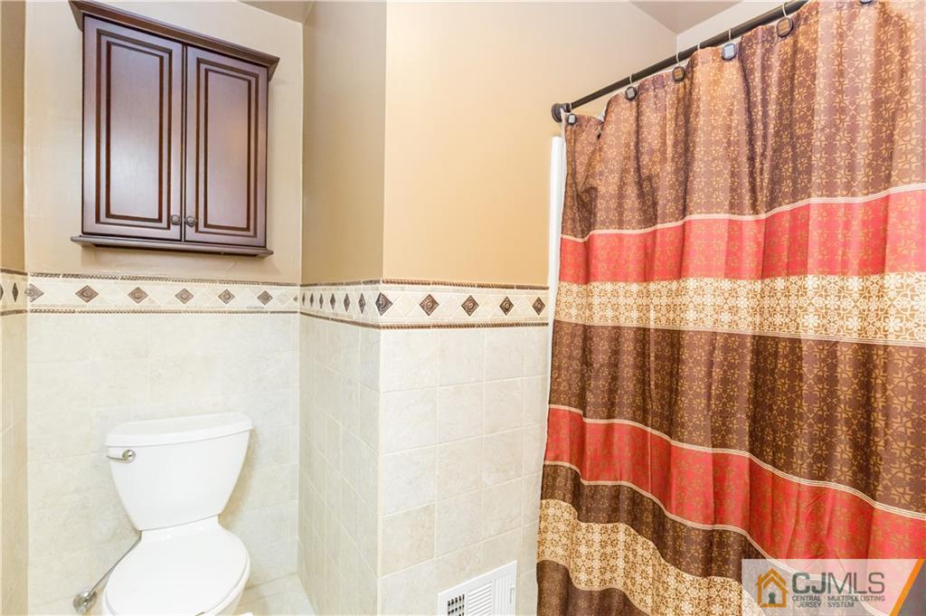 19 Bodnarik Road Edison, NJ 08837 - Photo 22 of 50 a bathroom with a toilet and a sink