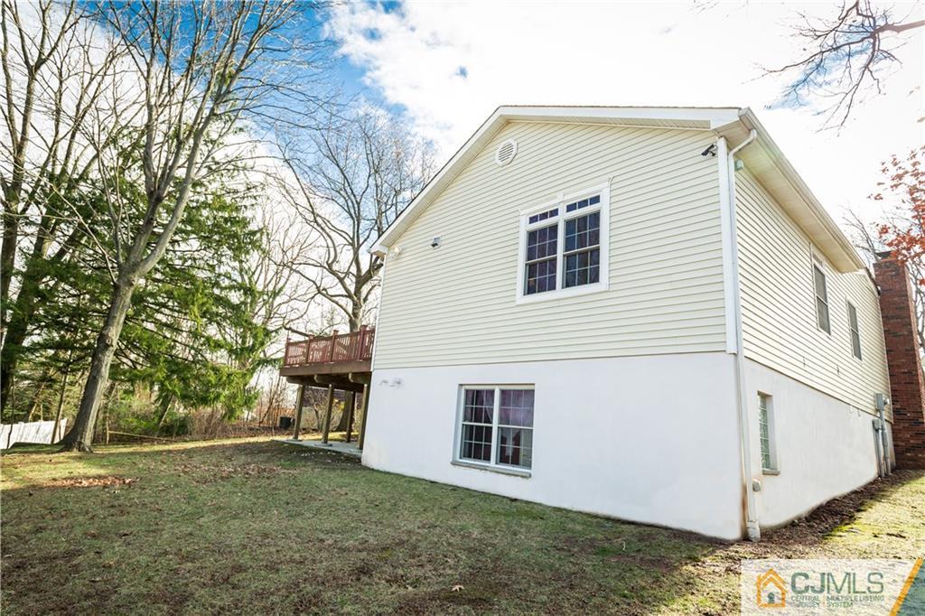 19 Bodnarik Road Edison, NJ 08837 - Photo 42 of 50 a view of a house with a yard