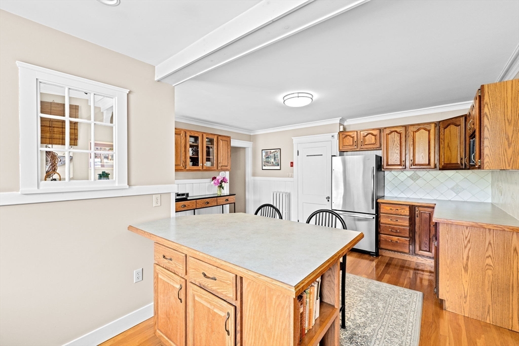 157 Branch Street Scituate, MA 02066 - Photo 12 of 41 a view of a kitchen with a sink and a refrigerator