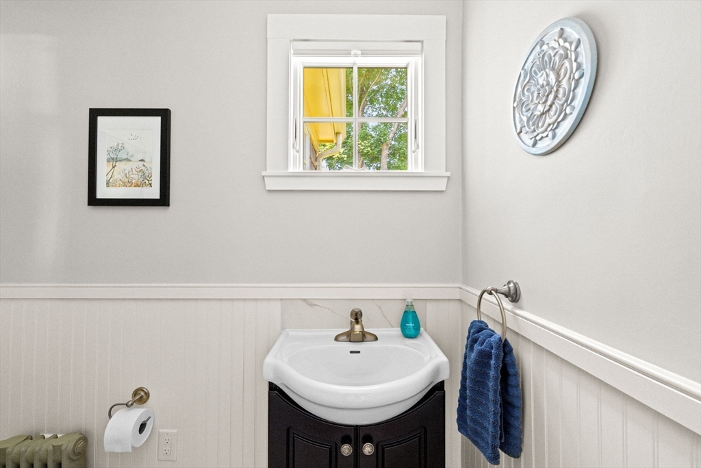 157 Branch Street Scituate, MA 02066 - Photo 19 of 41 a bathroom with a sink and a mirror