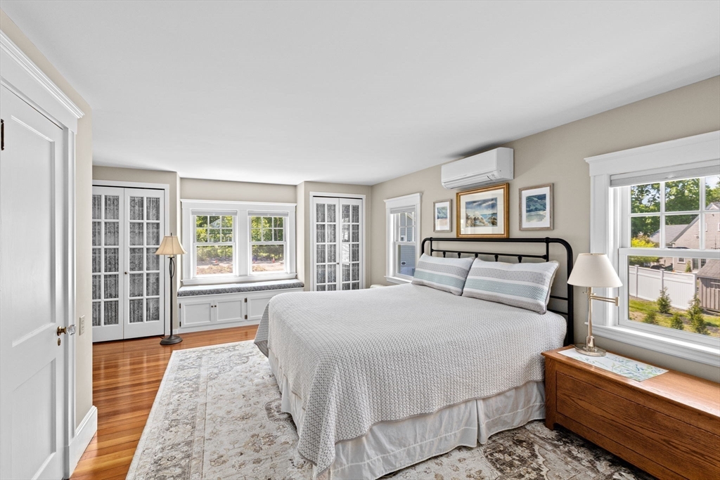 157 Branch Street Scituate, MA 02066 - Photo 21 of 41 a bedroom with a large bed and a window
