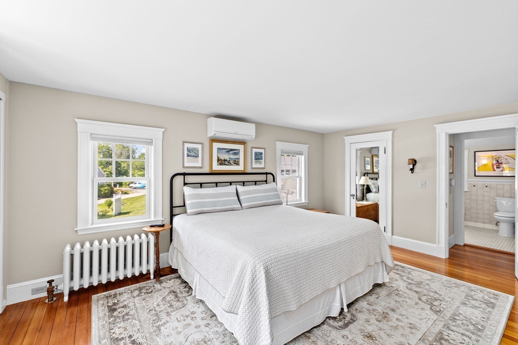 157 Branch Street Scituate, MA 02066 - Photo 22 of 41 a bedroom with a large bed and a window