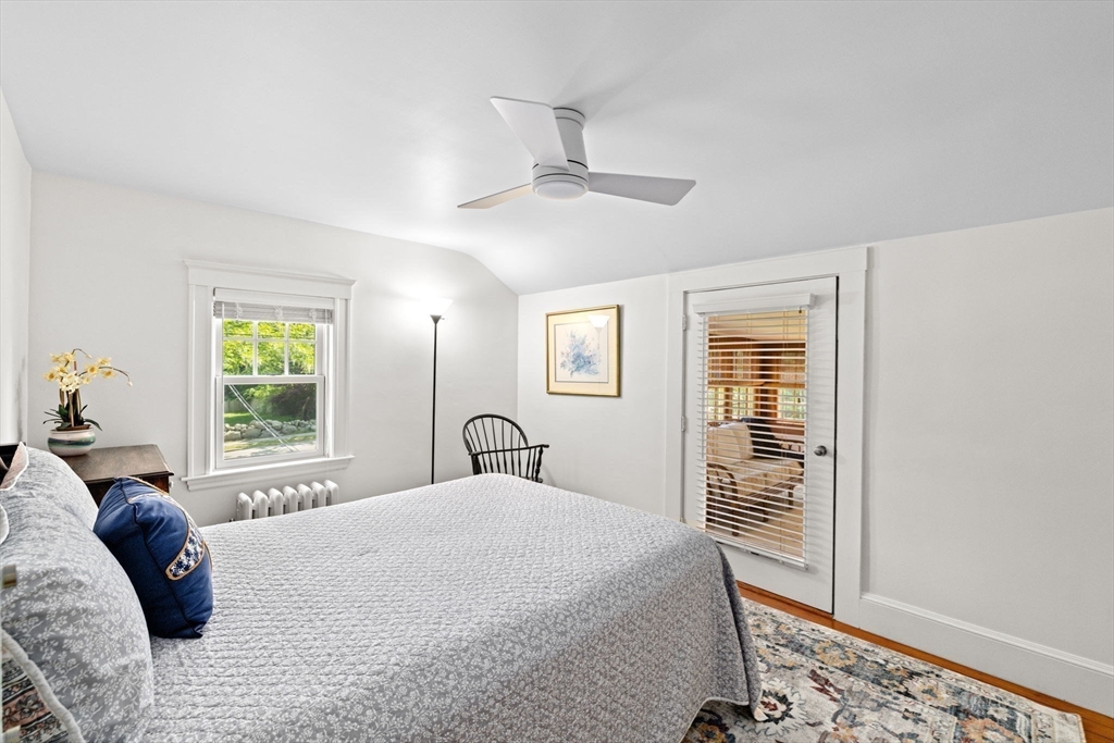 157 Branch Street Scituate, MA 02066 - Photo 27 of 41 a bedroom with a large bed and a window