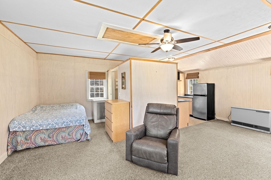 157 Branch Street Scituate, MA 02066 - Photo 32 of 41 a bedroom with furniture and a ceiling fan