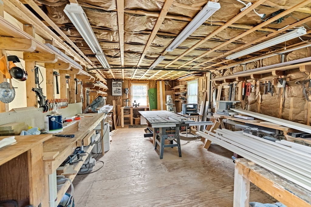 157 Branch Street Scituate, MA 02066 - Photo 35 of 41 a gym room with lots of wooden furniture and appliances