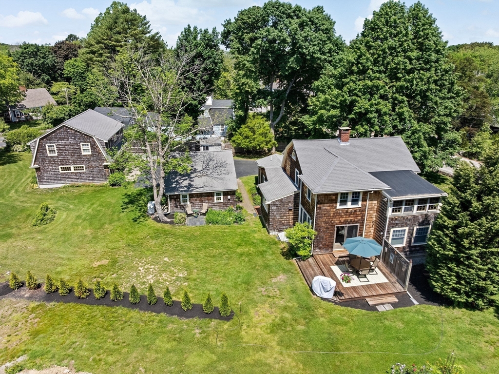 157 Branch Street Scituate, MA 02066 - Photo 5 of 41 an aerial view of a house with garden space and street view