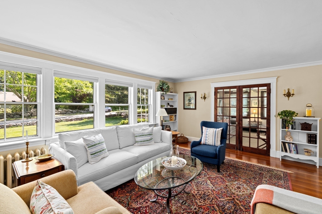 157 Branch Street Scituate, MA 02066 - Photo 8 of 41 a living room with furniture and floor to ceiling windows