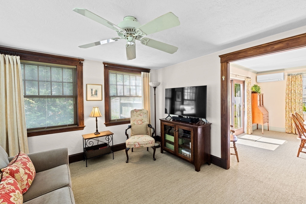 157 Branch Street Scituate, MA 02066 - Photo 10 of 41 a living room with furniture and a flat screen tv