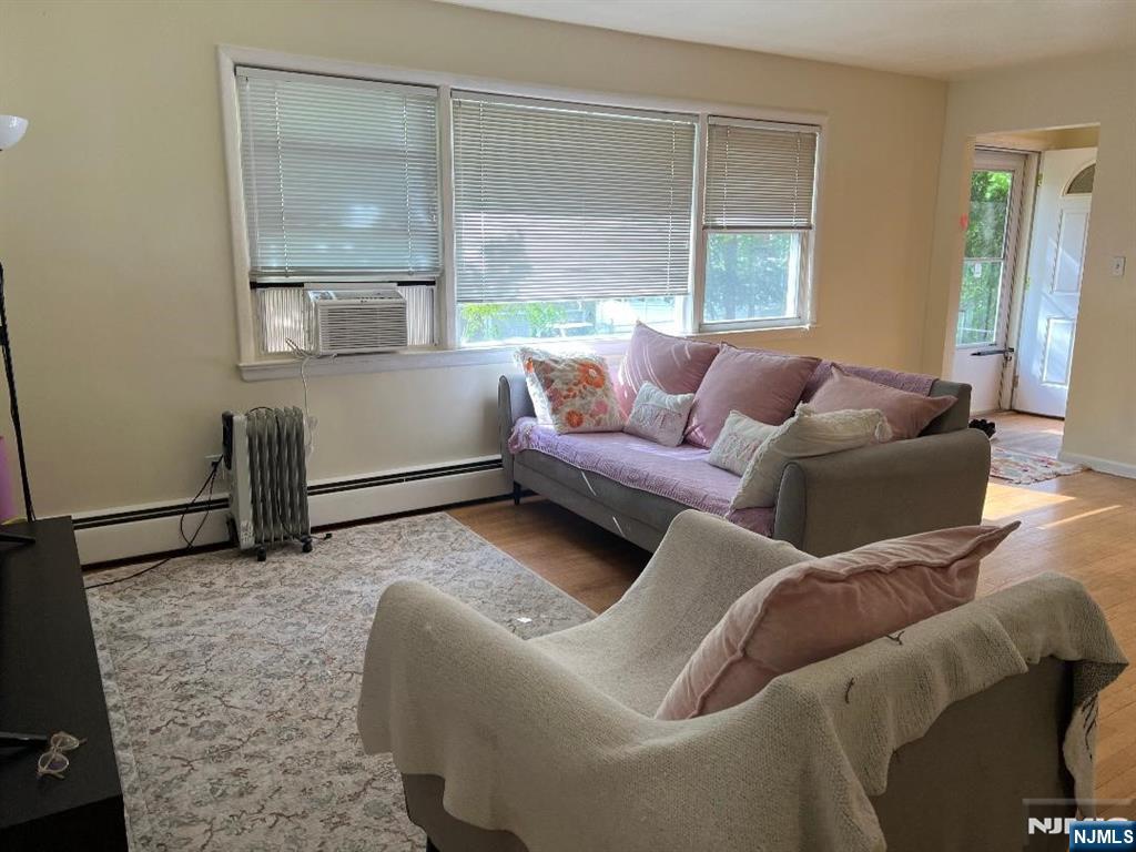 24 Ruth Lane Demarest, NJ 07627 - Photo 2 of 14 a living room with furniture and a window