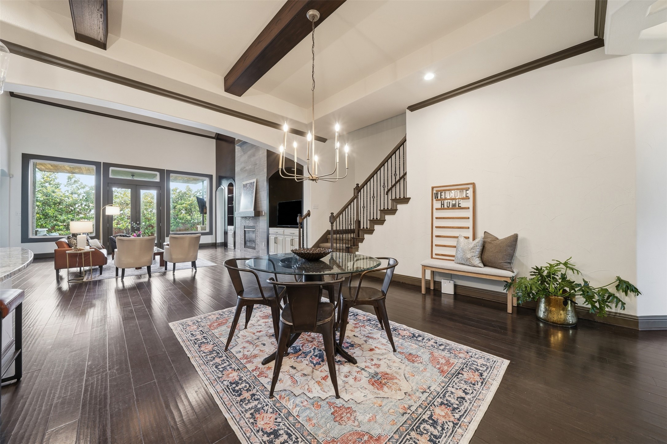 8729 Vantage Point Drive Austin, TX 78737 - Photo 17 of 33 Rich hardwood floors extend through this open-concept interior, offering a dining area adjacent to the elegant staircase.