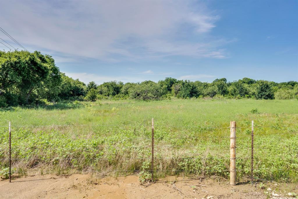 0 Fm-661 Midlothian, TX 76065 - Photo 17 of 30 a view of a lake with a big yard