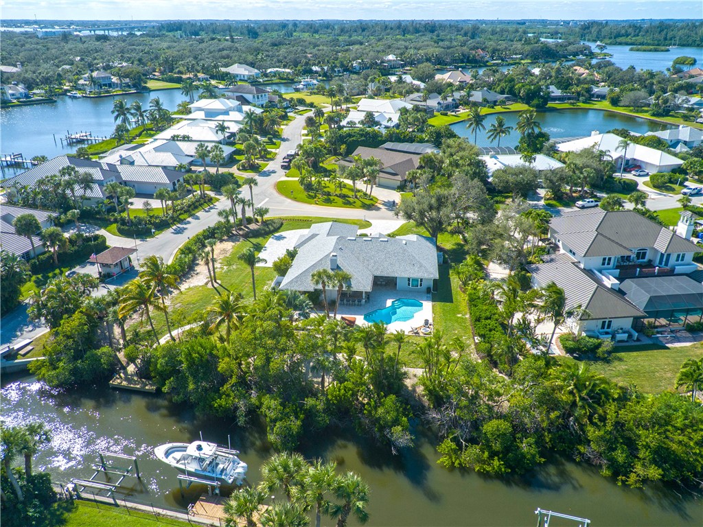 1 Cache Cay Drive Vero Beach, FL 32963 - Photo 36 of 36 an aerial view of residential houses with outdoor space and lake view