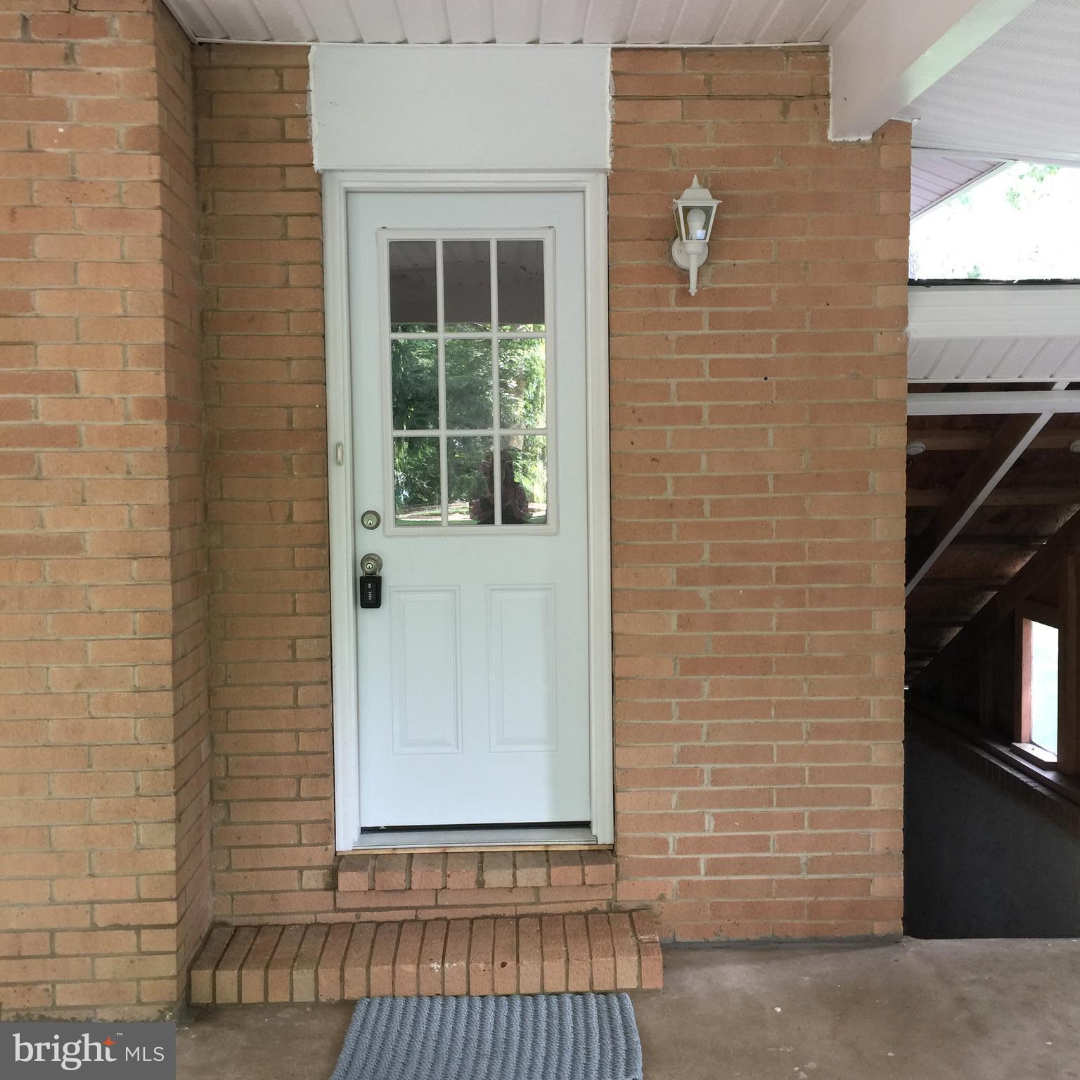 605 Dover Road Pasadena, MD 21122 - Photo 6 of 25 Carport Entrance