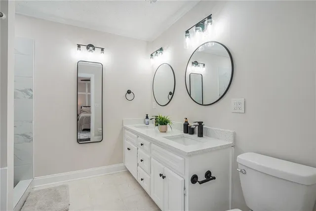 a bathroom with a toilet sink and a bathtub