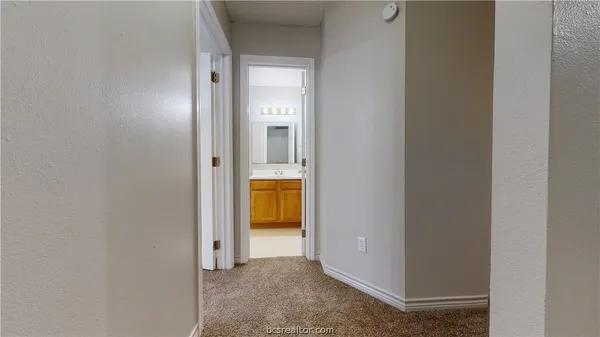 a view of a bathroom with a bathroom