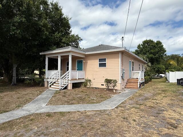 18066 Limestone Creek Road Limestone Creek, FL 33458 - Photo 18 of 25 a view of a house with a patio