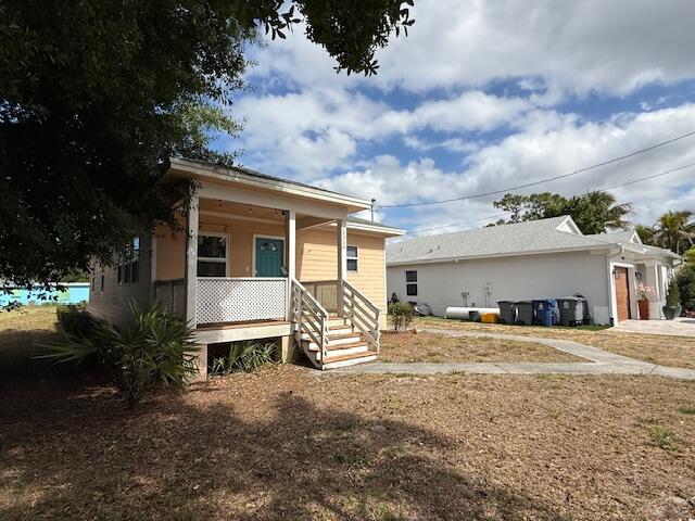 18066 Limestone Creek Road Limestone Creek, FL 33458 - Photo 3 of 25 a view of a house with a yard and sitting area