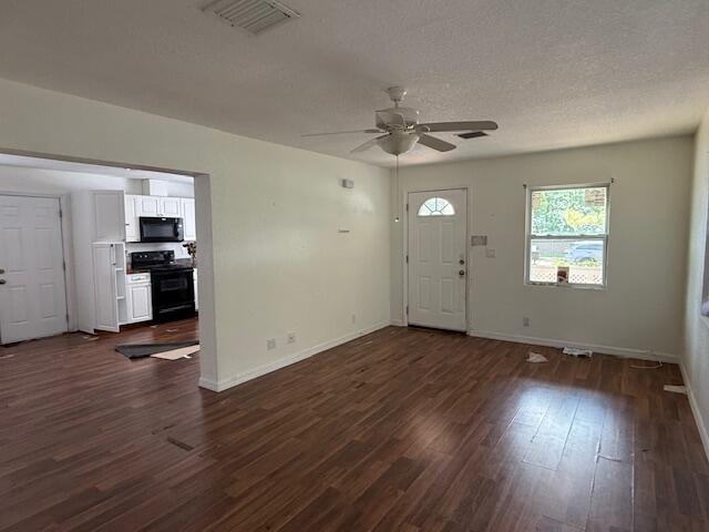 18066 Limestone Creek Road Limestone Creek, FL 33458 - Photo 9 of 25 wooden floor in an empty room with a window