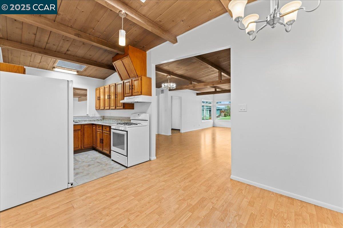 1655 Marlesta Road Pinole, CA 94564 - Photo 13 of 51 a view of a kitchen with a sink and a microwave
