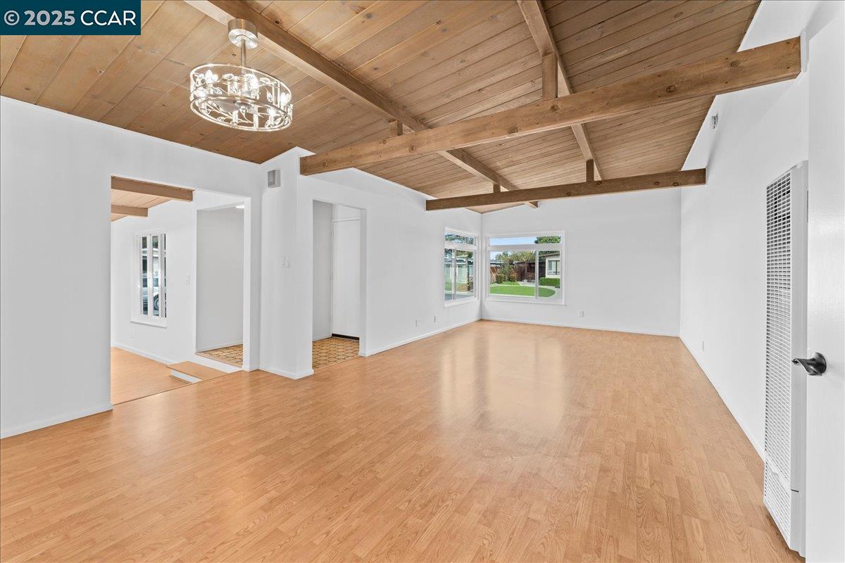 1655 Marlesta Road Pinole, CA 94564 - Photo 4 of 51 a view of a hallway with wooden floor