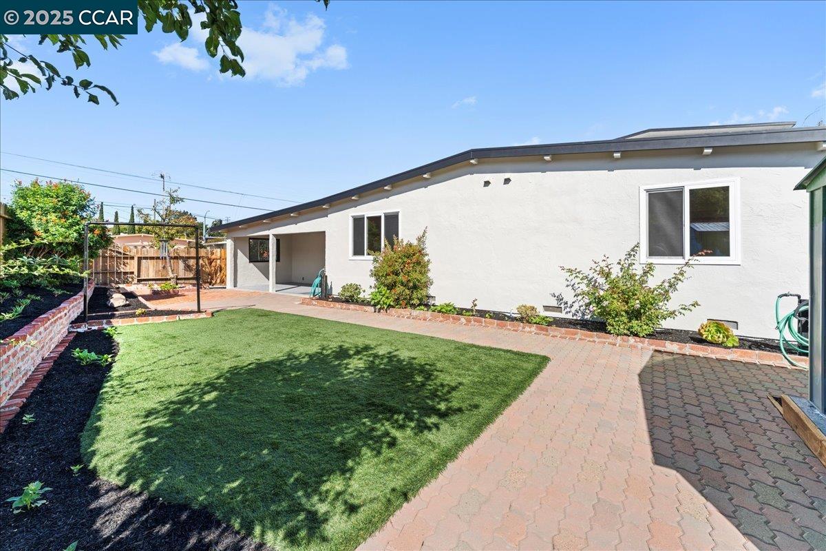 1655 Marlesta Road Pinole, CA 94564 - Photo 49 of 51 a front view of a house with garden