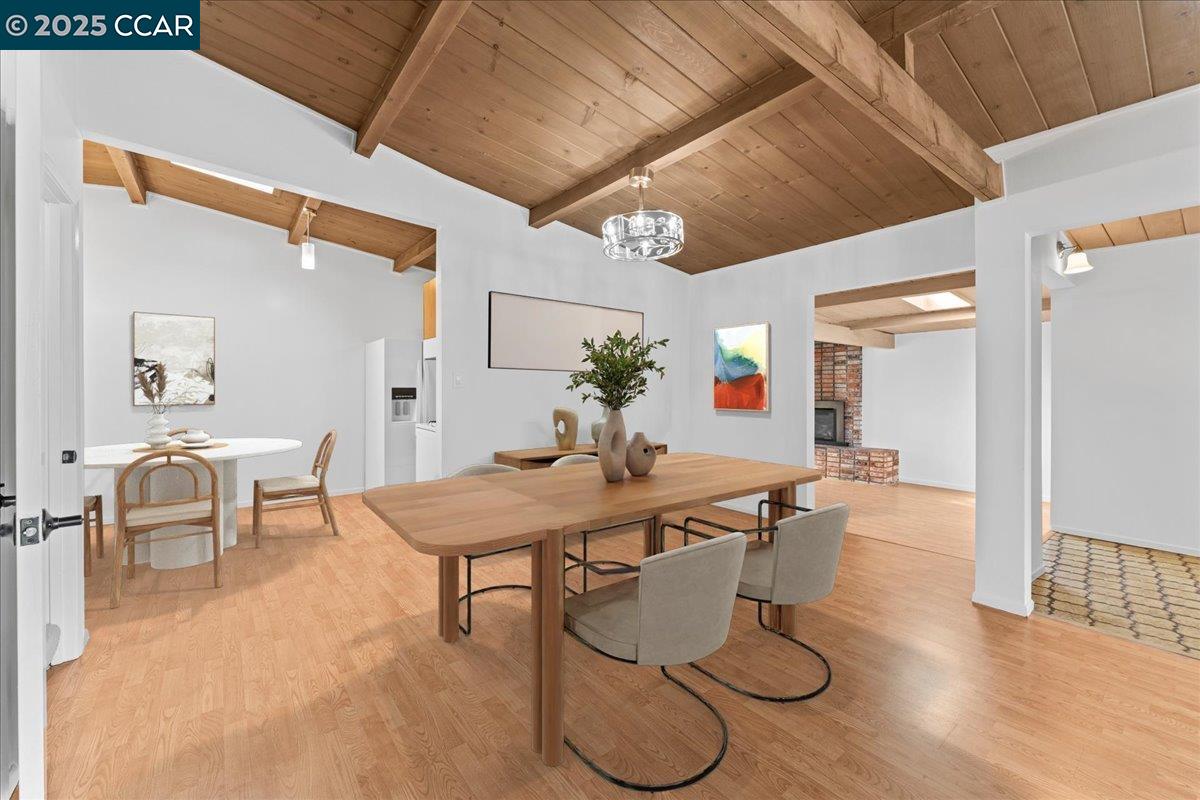 1655 Marlesta Road Pinole, CA 94564 - Photo 9 of 51 a view of a dining room with furniture and wooden floor