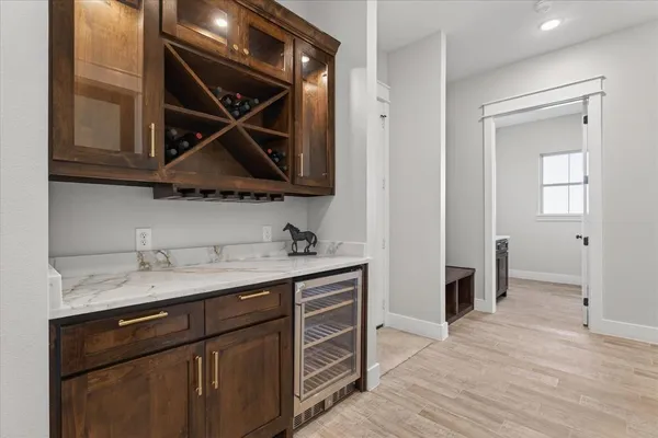 a spacious bedroom with a bed and a window