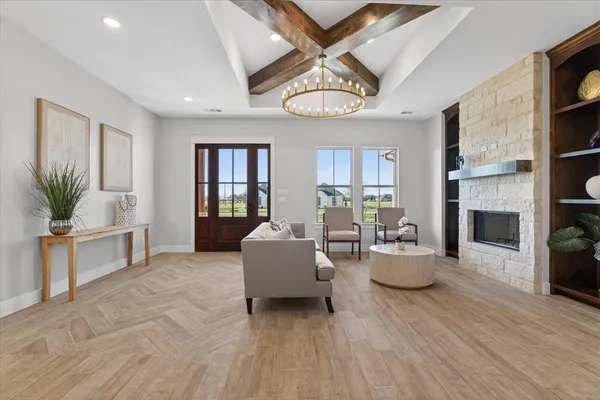 a kitchen with stainless steel appliances kitchen island granite countertop a sink and cabinets