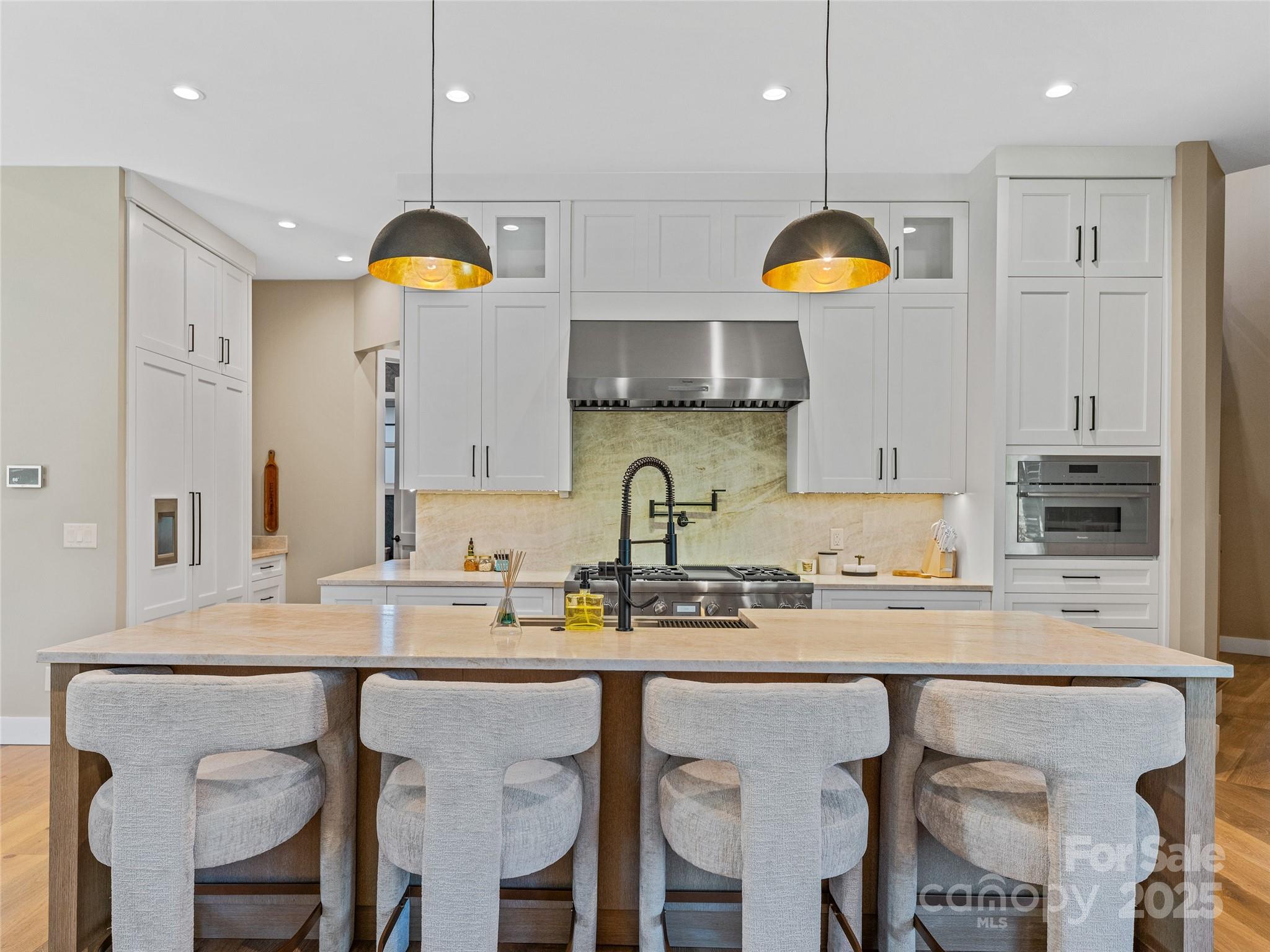 374 Turkey Roost Road Sapphire, NC 28774 - Photo 12 of 39 a kitchen with a sink and cabinets