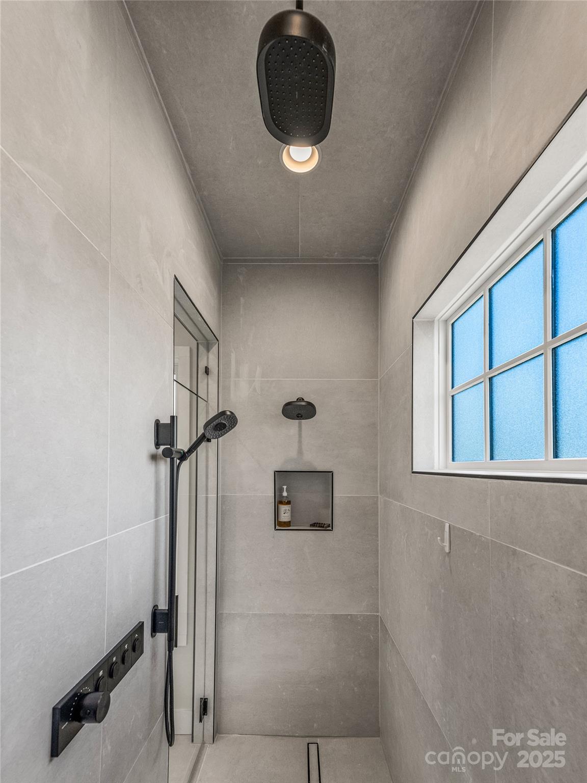 374 Turkey Roost Road Sapphire, NC 28774 - Photo 19 of 39 a bathroom with a shower