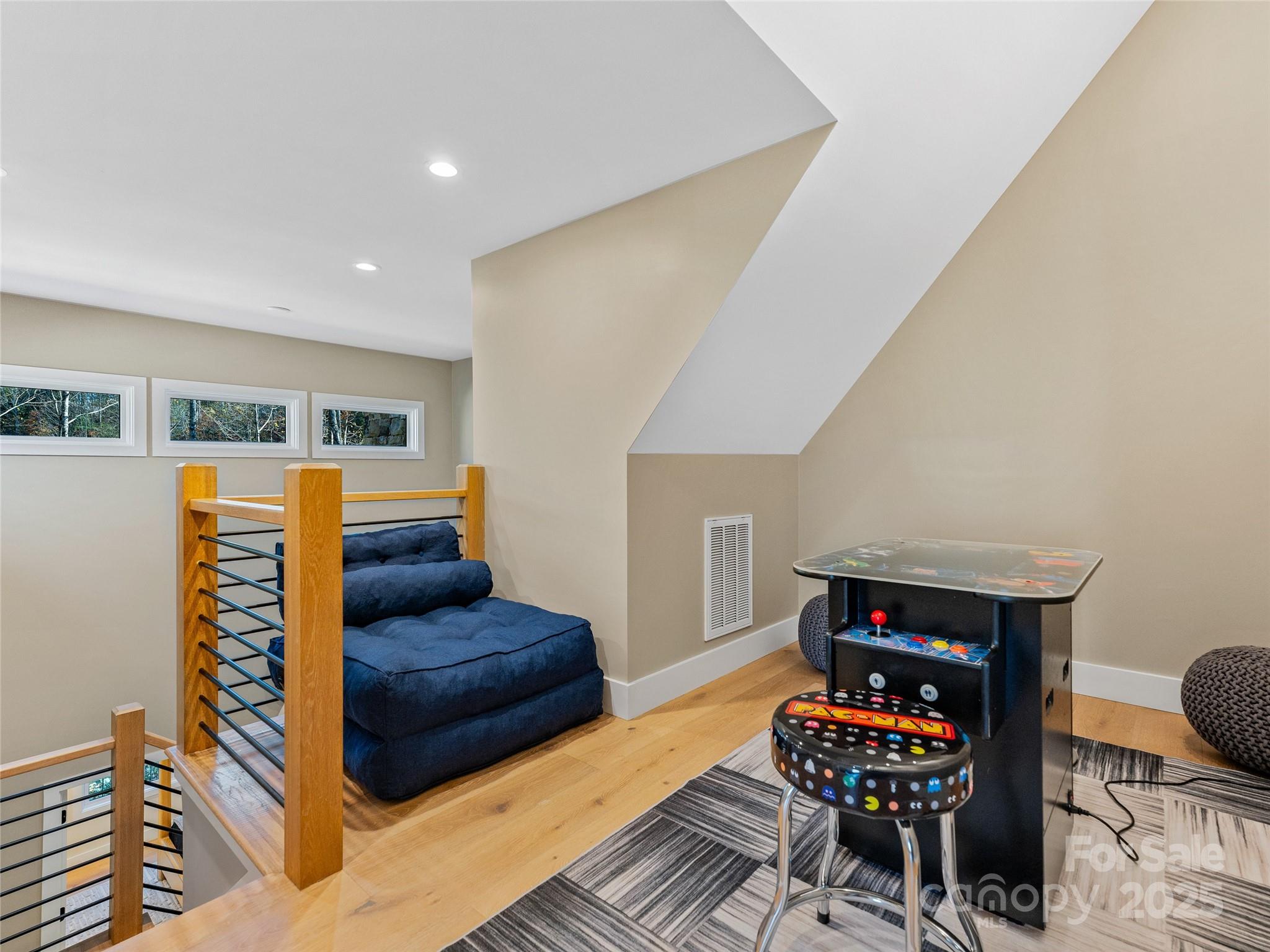374 Turkey Roost Road Sapphire, NC 28774 - Photo 27 of 39 a living room with furniture and a wooden floor