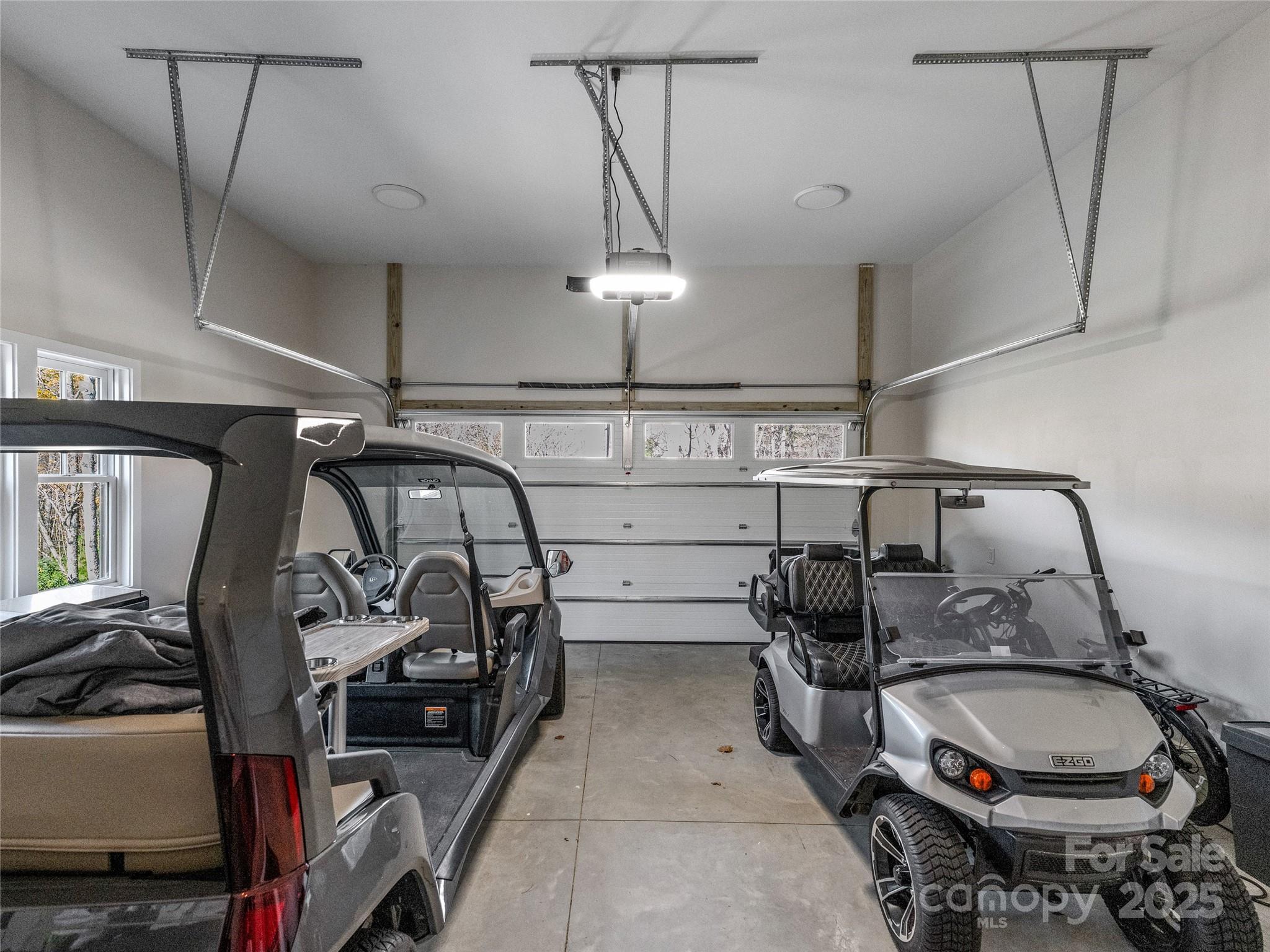 374 Turkey Roost Road Sapphire, NC 28774 - Photo 33 of 39 a bathroom with double vanity and a mirror