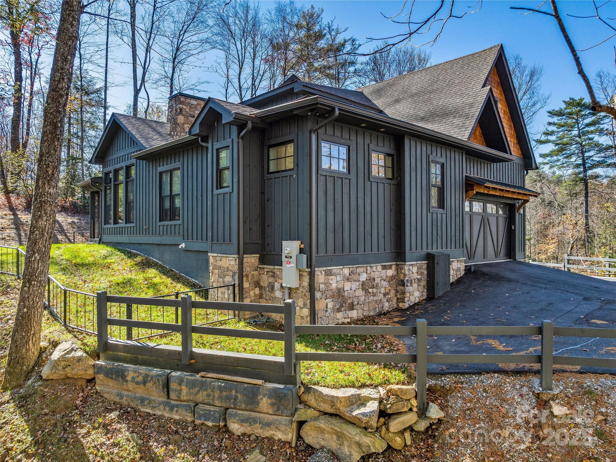 374 Turkey Roost Road Sapphire, NC 28774 - Photo 35 of 39 a view of a house with a tub