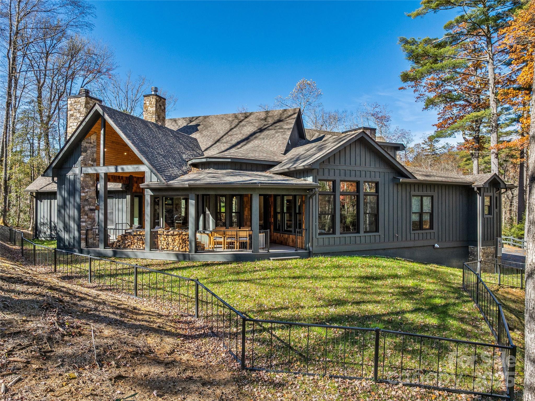 374 Turkey Roost Road Sapphire, NC 28774 - Photo 38 of 39 a view of a house with swimming pool and a yard