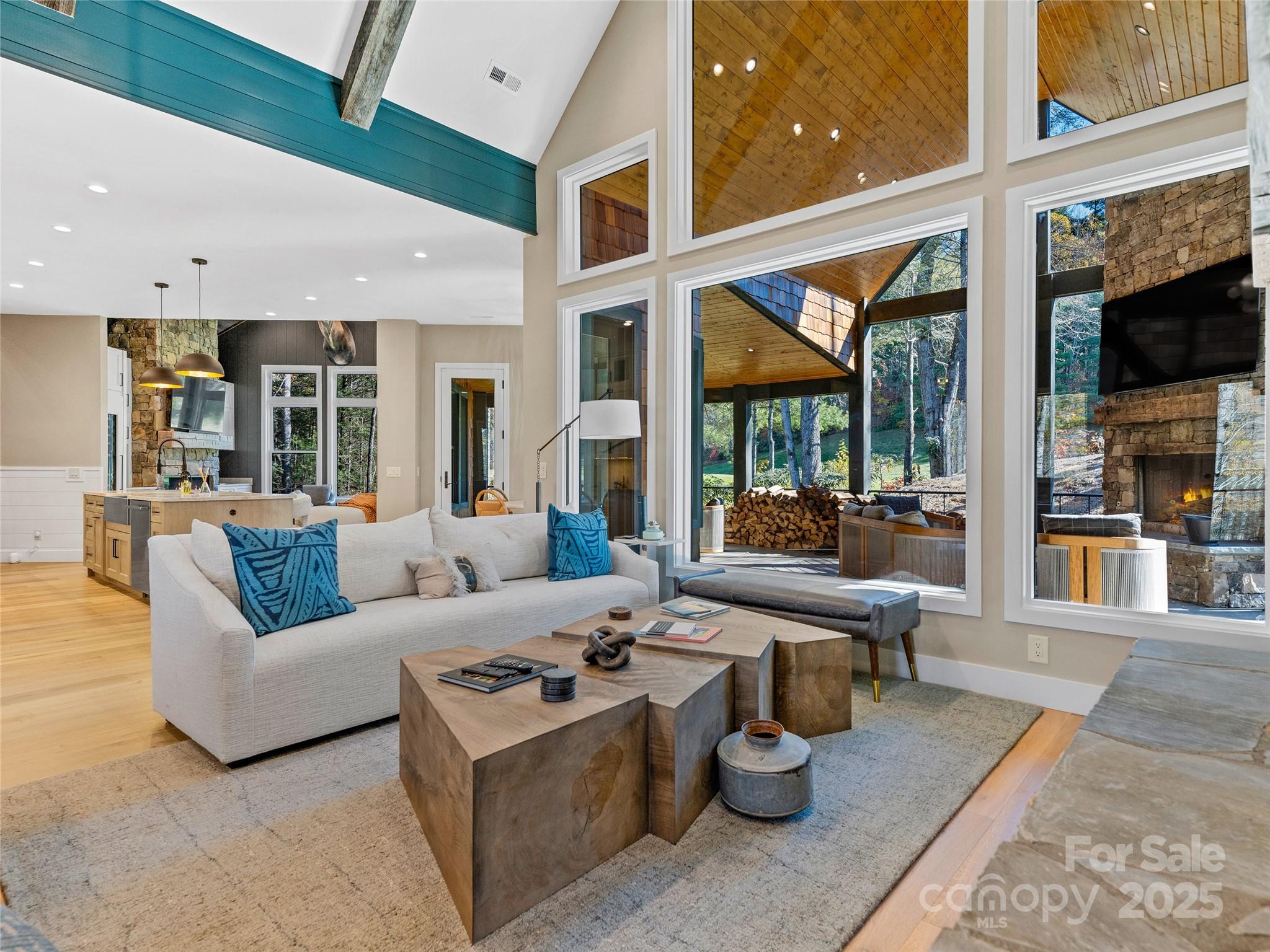 374 Turkey Roost Road Sapphire, NC 28774 - Photo 8 of 39 a living room with furniture and a large window
