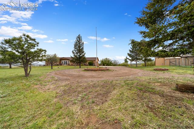 3240 Spaatz Road Monument, CO 80132 - Photo 8 of 45 Space for even big trucks to turn around the Flag Pole!