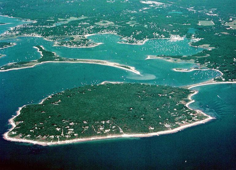a view of a golf course with a lake