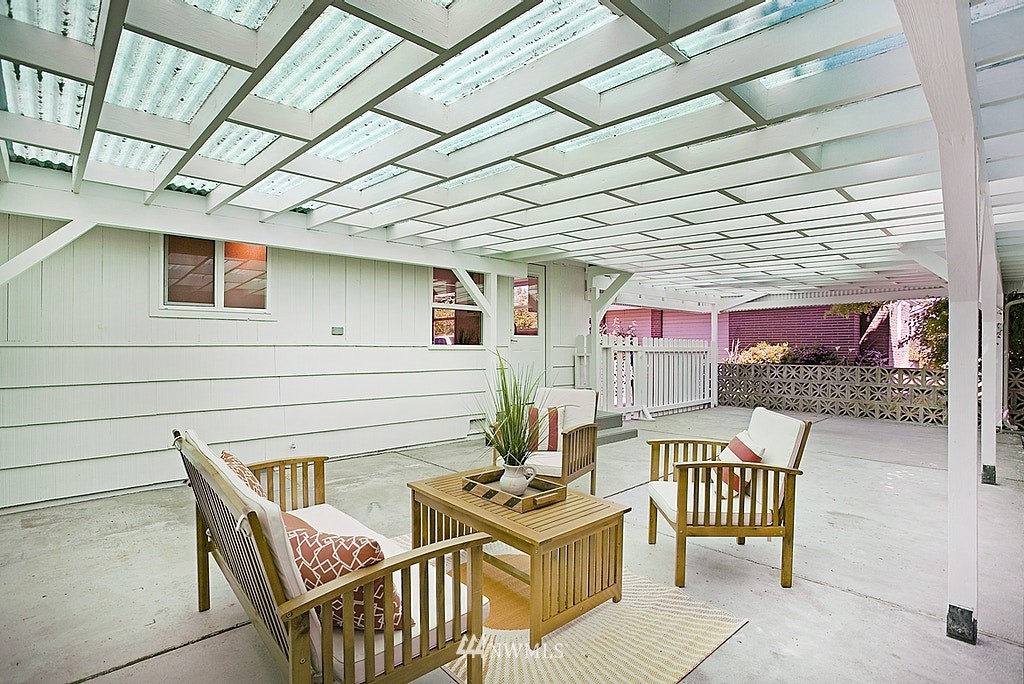 9226 13th Avenue Southwest Seattle, WA 98106 - Photo 11 of 13 a view of a patio with a table and chairs