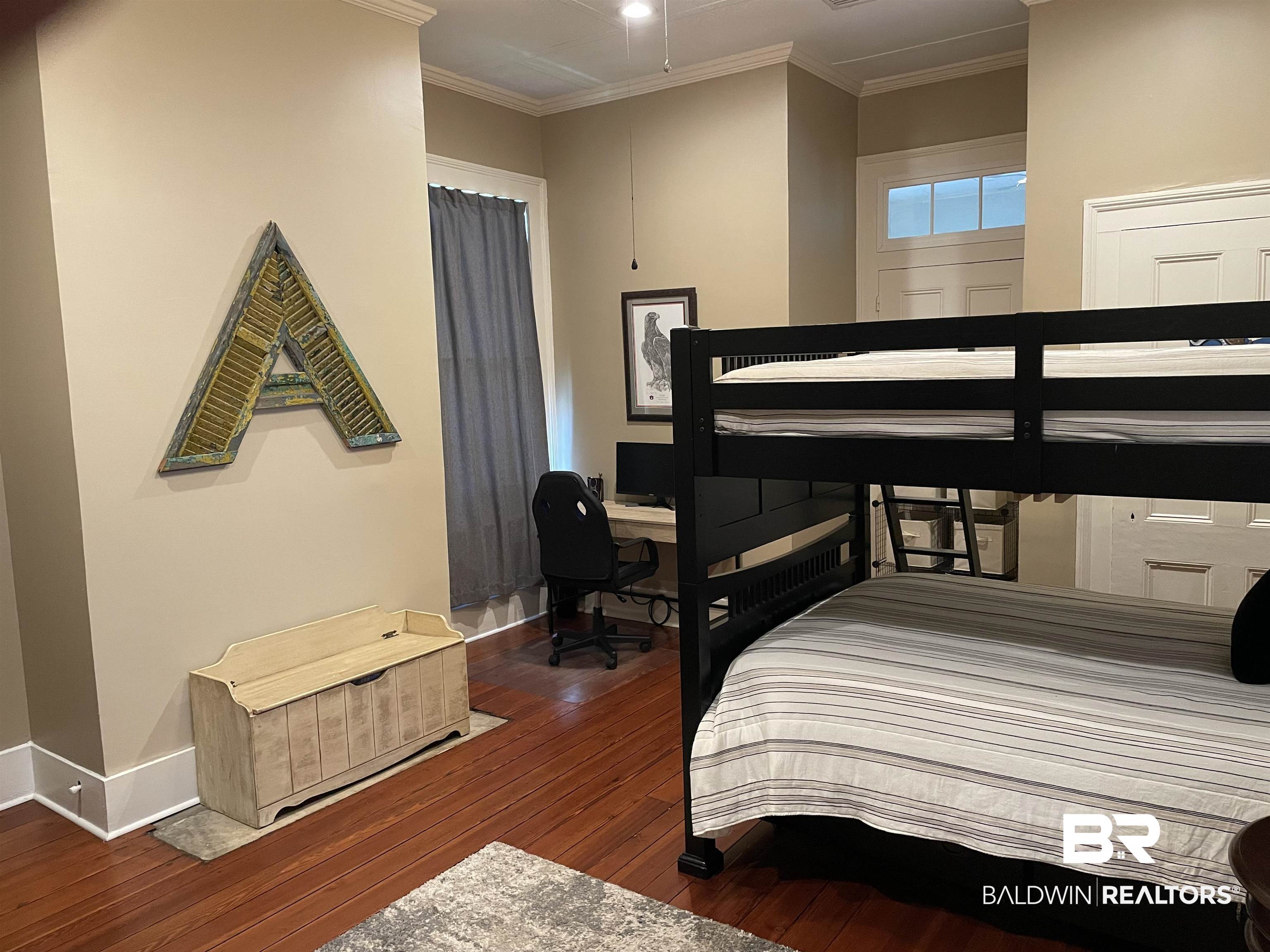 1001 Augusta Street Mobile, AL 36604 - Photo 7 of 26 Bedroom featuring dark wood-type flooring and ornamental molding