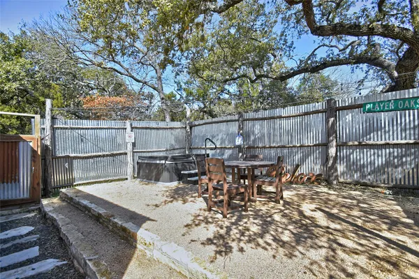 a view of a livingroom with furniture window and wooden floor