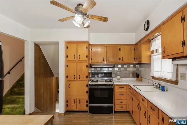 a bedroom with a bed and a view of bedroom